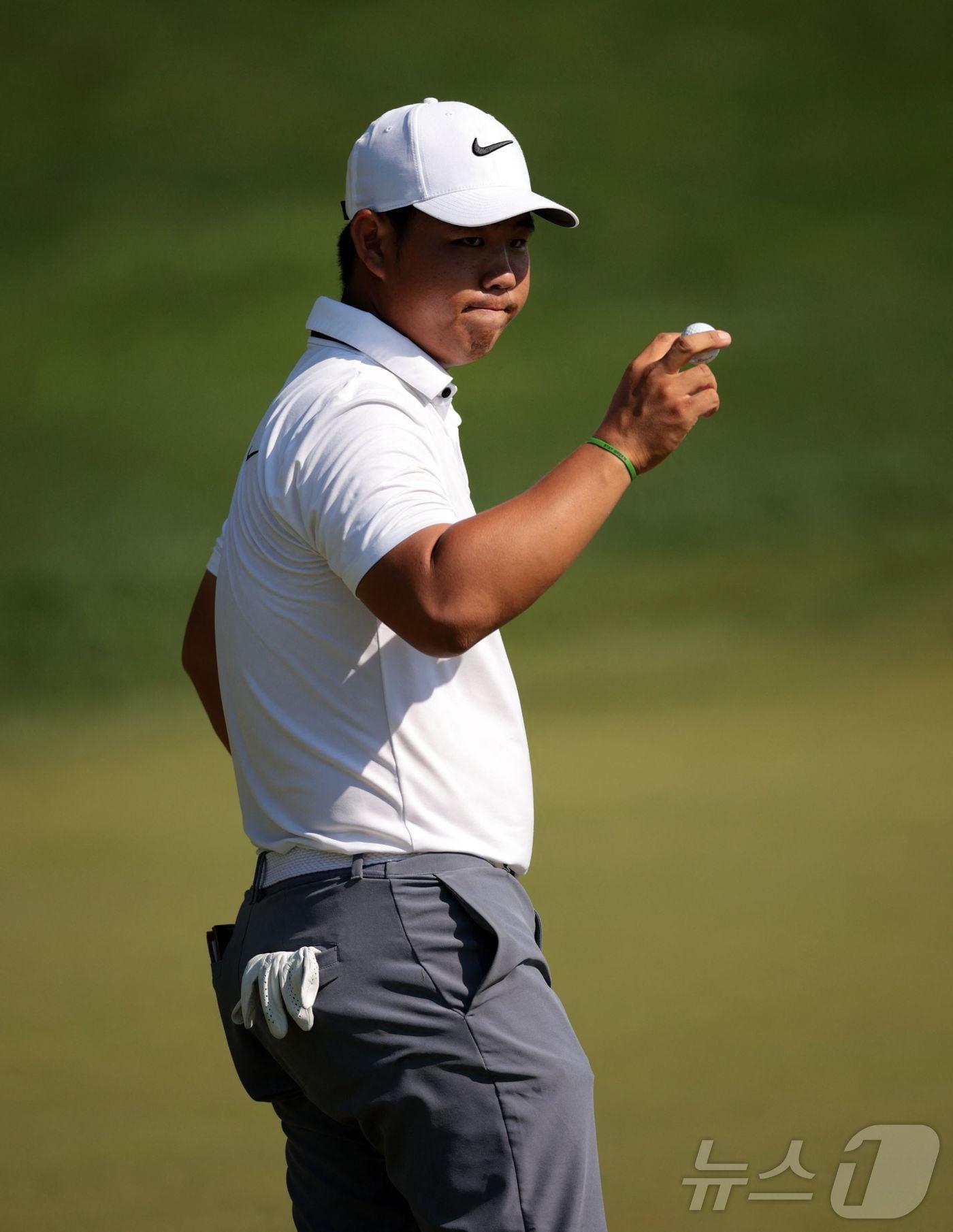 본문 이미지 - 김주형(22·나이키골프)이 21일(한국시간) 열린 PGA투어 트래블러스 챔피언십 1라운드에서 단독 선두에 올랐다. ⓒ AFP=뉴스1