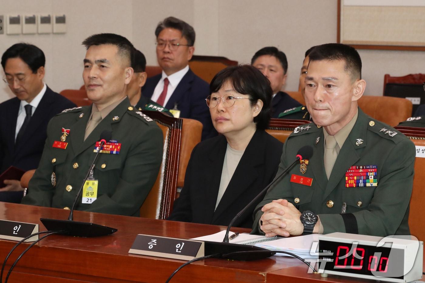 임성근 전 해병대 1사단장(오른쪽부터)과 유재은 국방부 법무관리관, 박정훈 전 해병대 수사산장이 지난 21일 오전 서울 여의도 국회에서 열린 법제사법위원회 전체회의 순직 해병 수사 방해 및 사건 은폐 등의 진상규명을 위한 특별검사의 임명 등에 관한 법률안 관련 입법청문회에 증인으로 출석해 의원 질의를 듣고 있다. 2024.6.21/뉴스1 ⓒ News1 이광호 기자