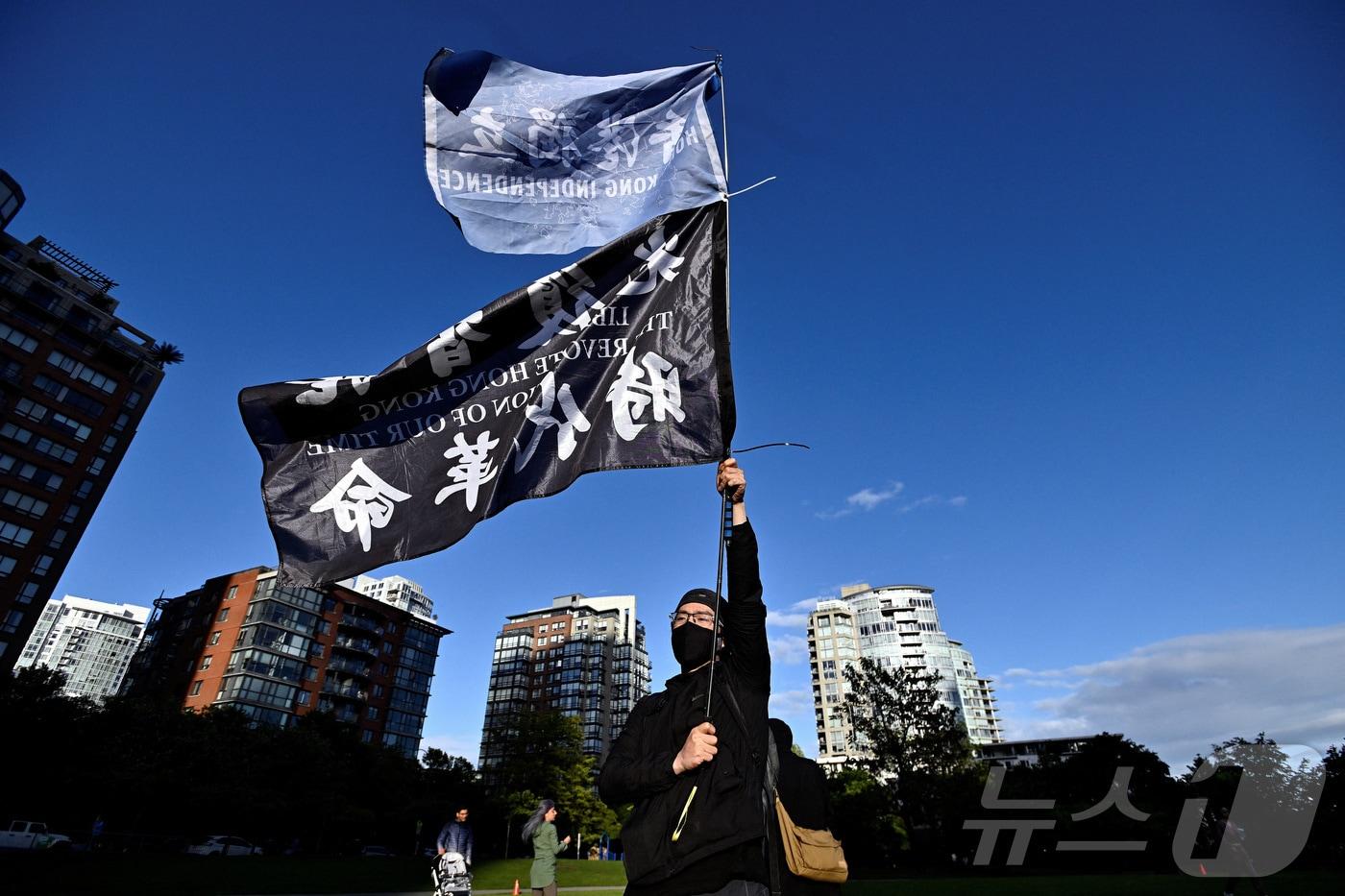4일&#40;현지시간&#41; 캐나다 밴쿠버에서 톈안먼 민주화 시위 35주년을 추모하는 촛불 집회가 열렸다. 톈안만 시위 언급이 금지된 중국과 홍콩에서는 관련 추모 행사는 열리지 못한다. 2024.06.04/ ⓒ 로이터=뉴스1 ⓒ News1 박재하 기자