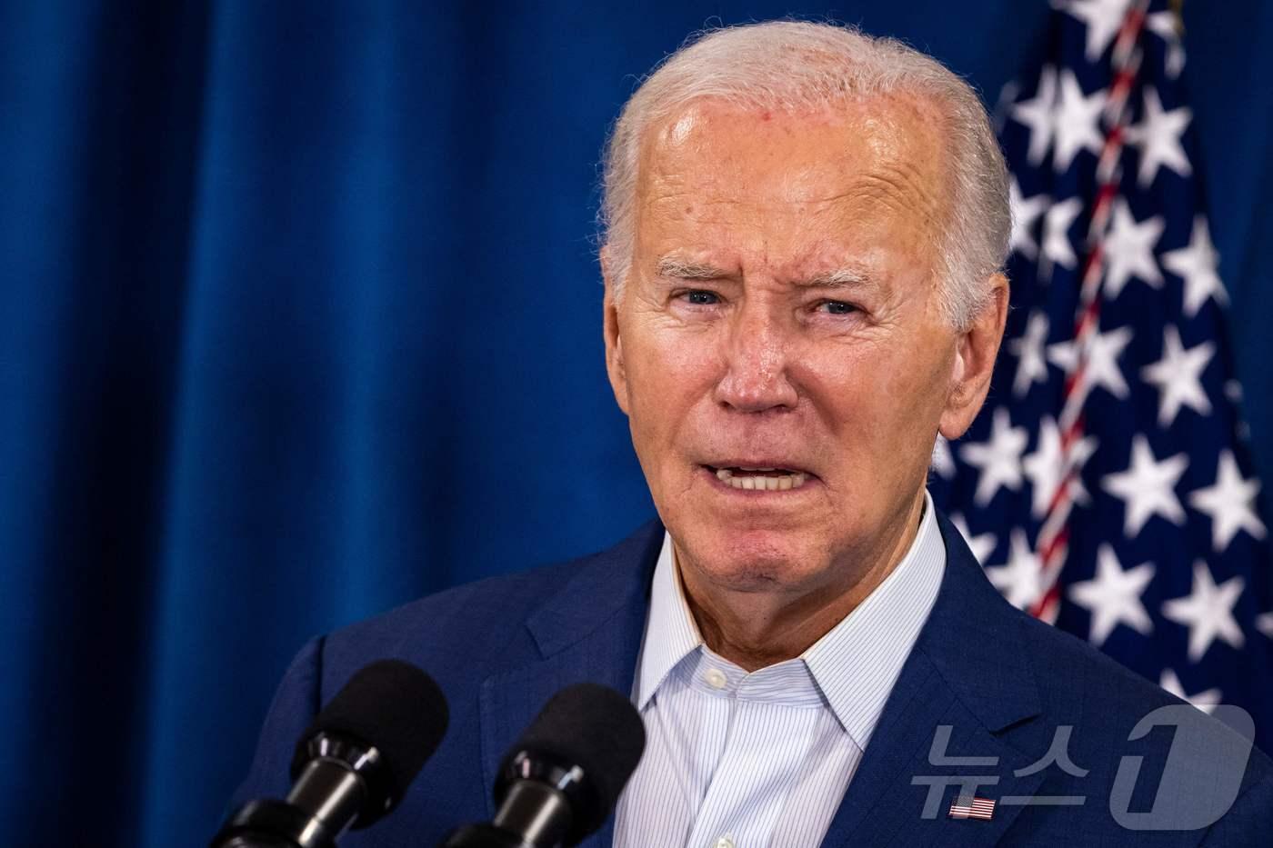 조 바이든 미국 대통령이 13일 (현지시간) 델라웨어주 레호보스 비치에서 도널드 트럼프 전 대통령의 유세 도중에 일어난 총격 테러와 관련한 대국민 연설서 "트럼프 전 대통령이 지금 의료진과 있고 괜찮은 상태라면서 곧 그와 대화할 수 있기를 희망한다＂고 밝히고 있다. 2024.07.14 ⓒ AFP=뉴스1 ⓒ News1 우동명 기자