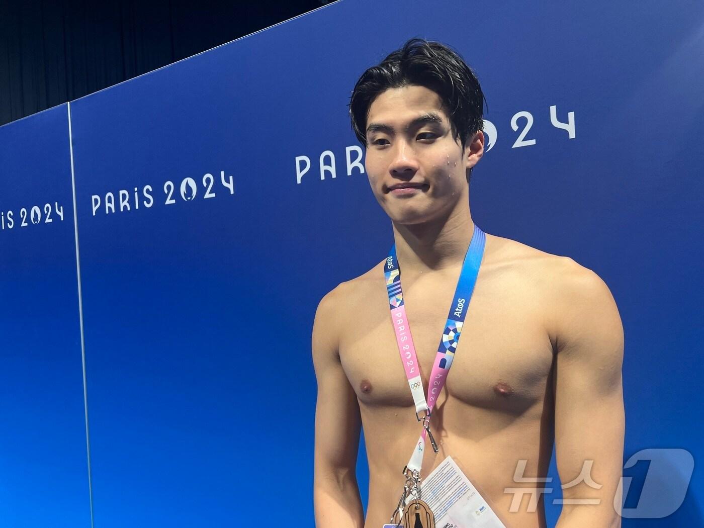 본문 이미지 - 황선우가 30일 오후(한국시간) 프랑스 파리 라데팡스 아레나에서 열린 2024 파리 올림픽 경영 남자 자유형 100m 예선을 마친 뒤 취재진과 인터뷰하고 있다. 2024.7.30/뉴스1 ⓒ News1 이상철 기자