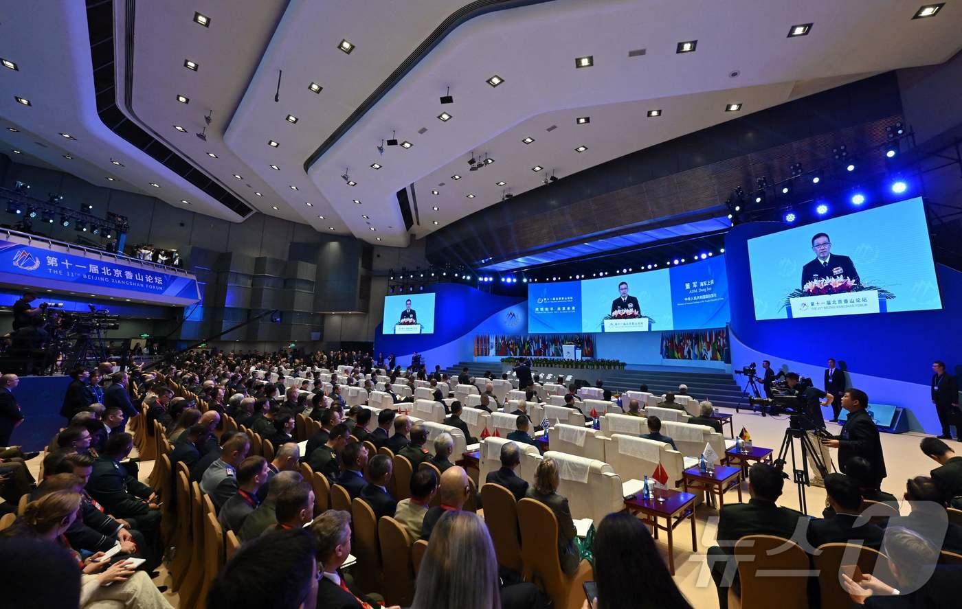 지난해 9월 13일 중국 베이징 국제컨벤션센터에서 열린 샹산포럼 개막식에서 둥쥔 중국 국방부장&#40;장관&#41;이 연설을 하고 있다. 2024.09.13 ⓒ AFP=뉴스1 ⓒ News1 김지완 기자