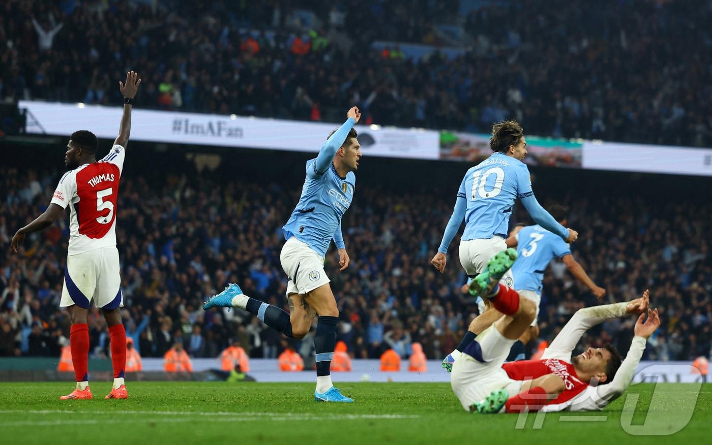 본문 이미지 - 맨시티가 아스널을 상대로 극적 무승부를 거뒀다. ⓒ 로이터=뉴스1