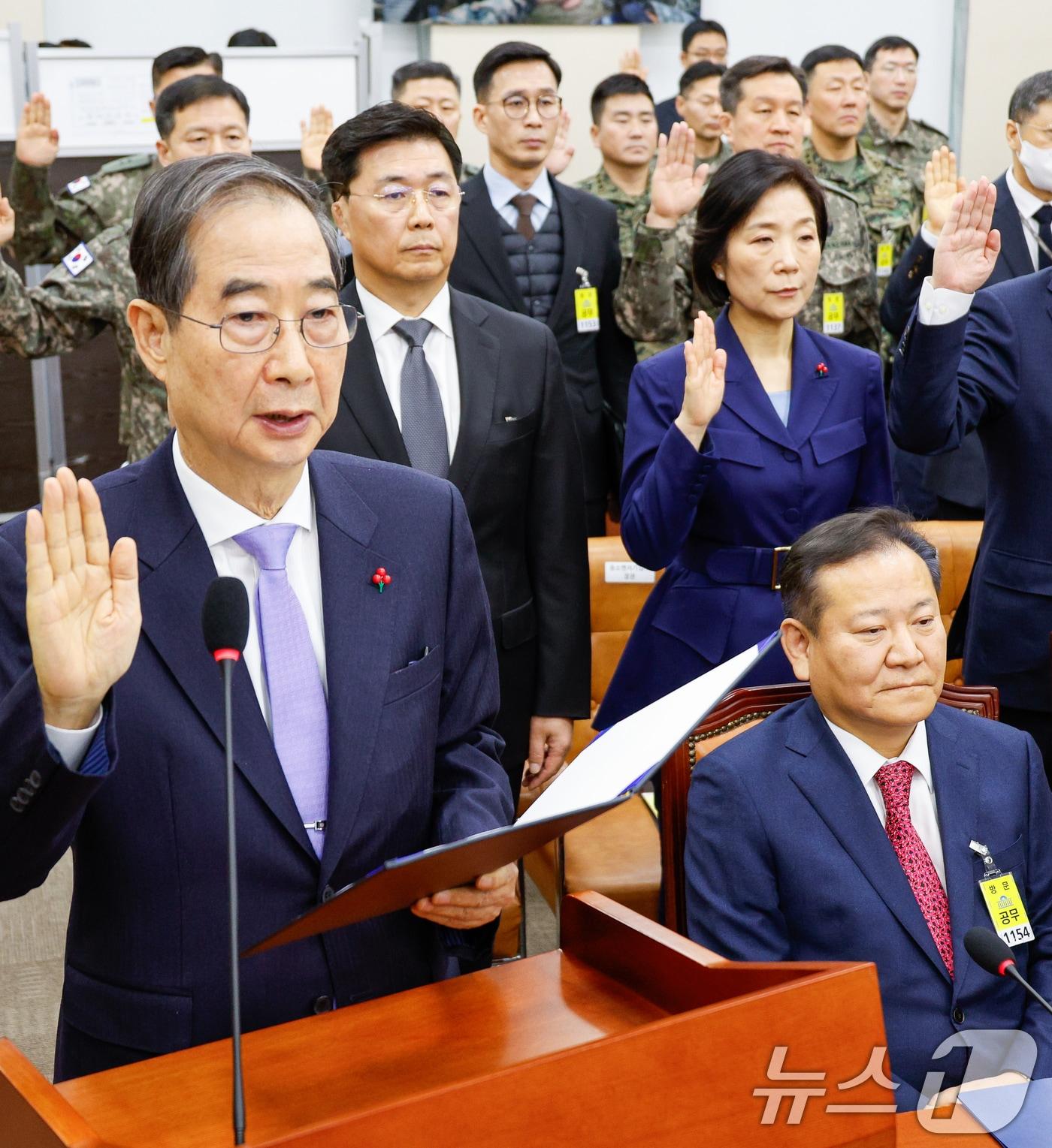본문 이미지 - 지난해 1월22일 국회 내란국정조사특별위원회 청문회에 출석한 한덕수 전 국무총리와 이상민 전 행정안전부 장관.2025.1.22 ⓒ 뉴스1 안은나 기자