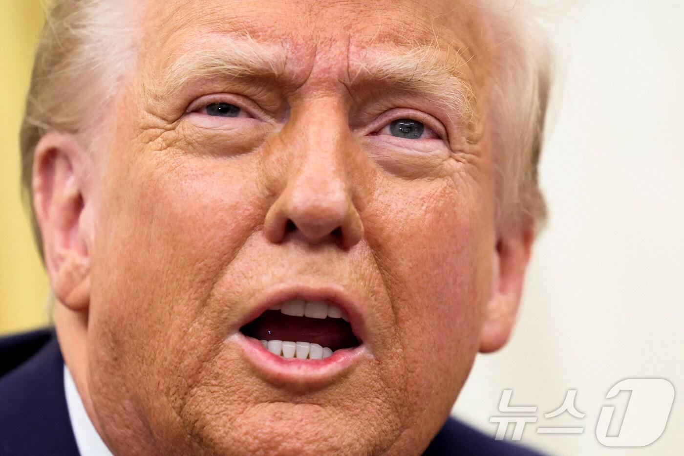 도널드 트럼프 미국 대통령이 23일(현지시간) 워싱턴 백악관에서 열린 행정명령 서명식에서 발언하고 있다. 2025.01.24 ⓒ 로이터=뉴스1 ⓒ News1 우동명 기자