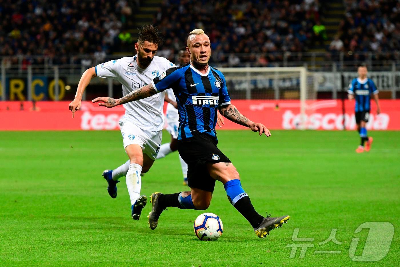 코카인 밀수 혐의로 체포된 나잉골란. ⓒ AFP=뉴스1