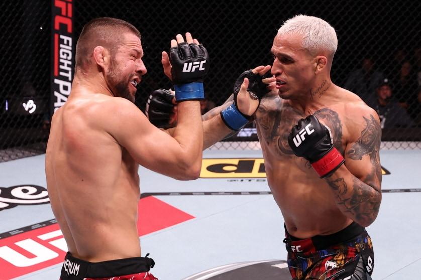 본문 이미지 - 올리베이라(오른쪽)가 감롯을 꺾고 재기에 성공했다.(UFC 제공)