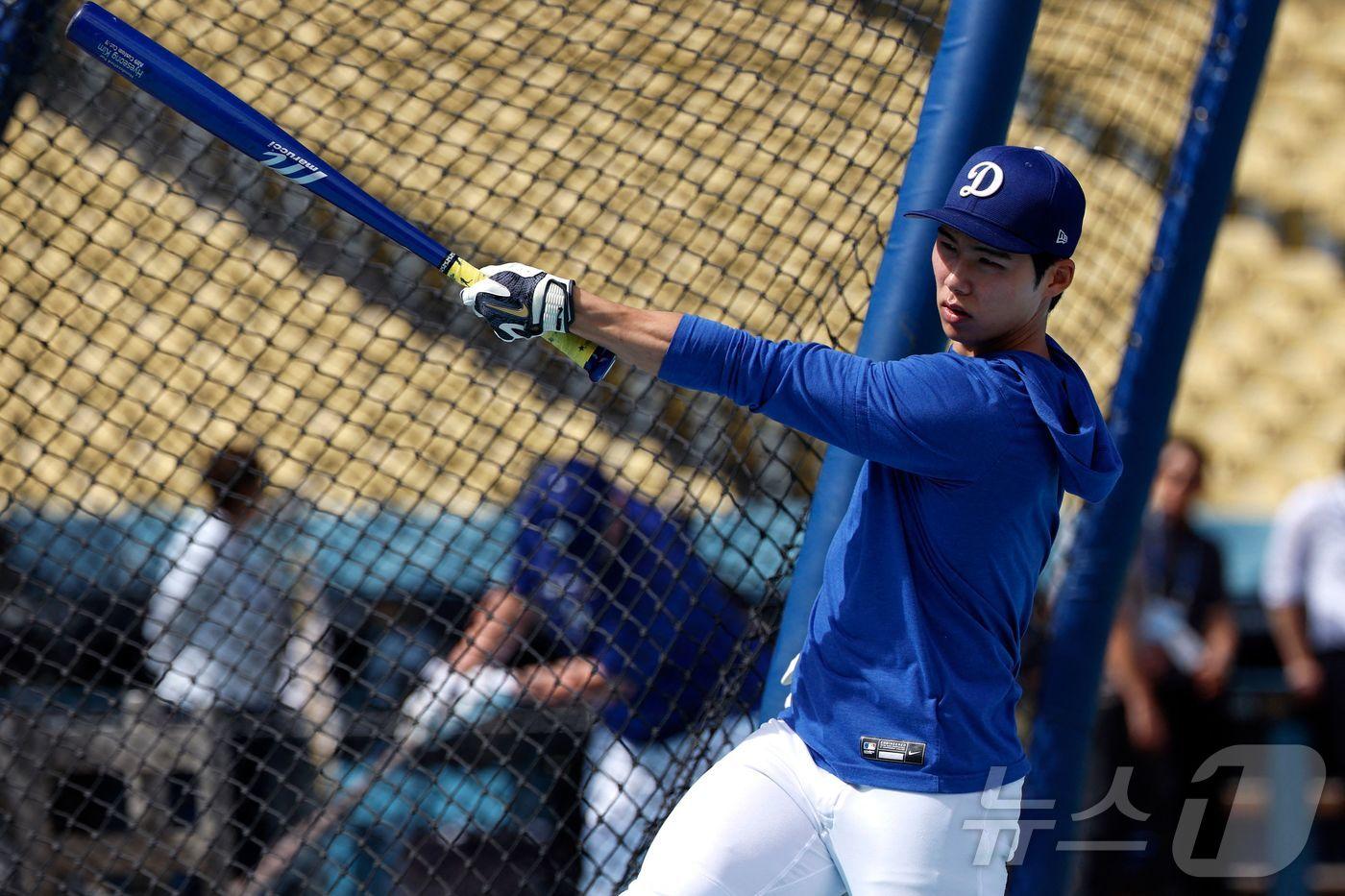 훈련하는 LA 다저스 김혜성. ⓒ AFP=뉴스1