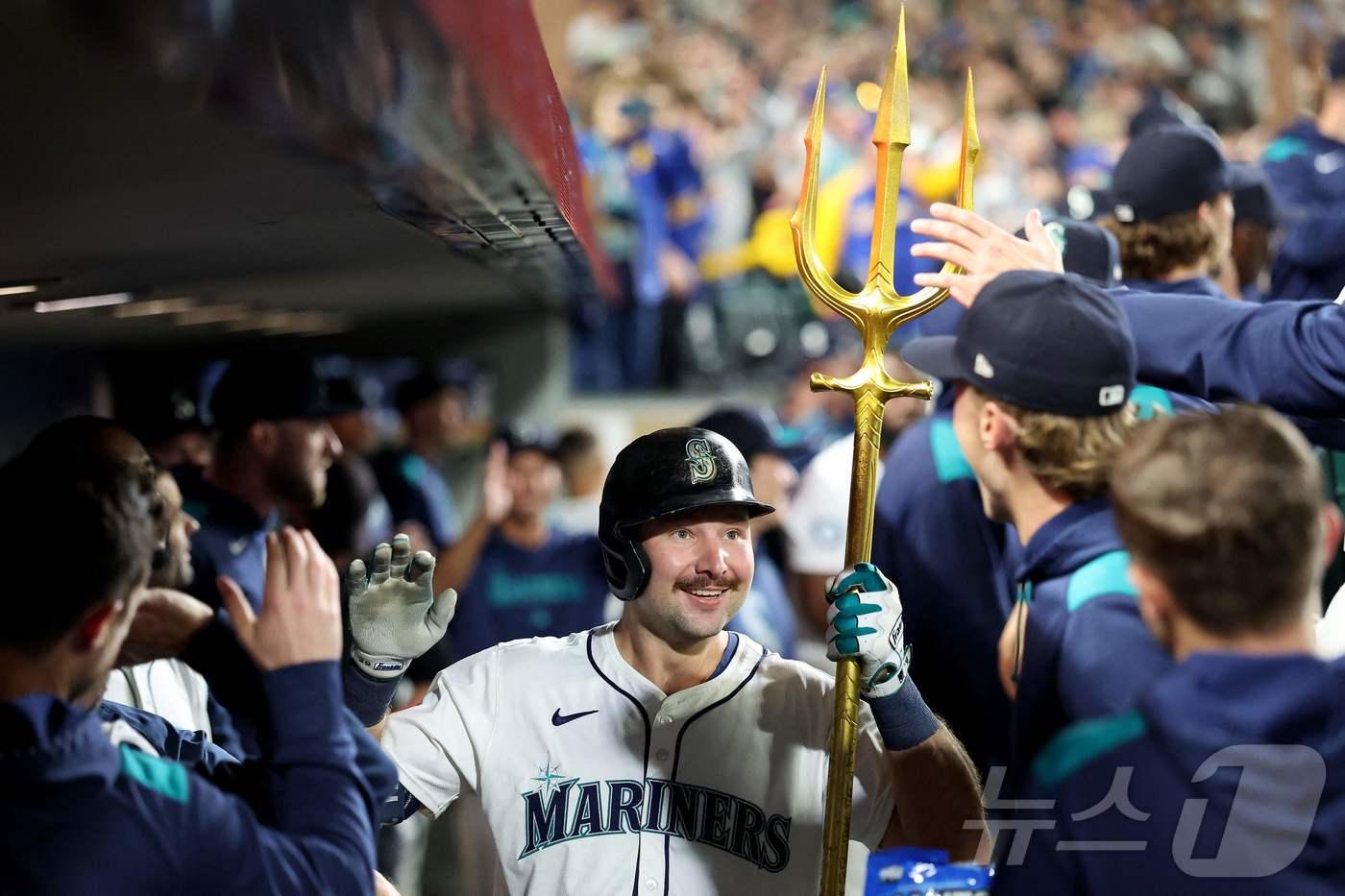 MLB 포수 최초 60홈런을 돌파한 시애틀 칼 롤리.ⓒ AFP=뉴스1