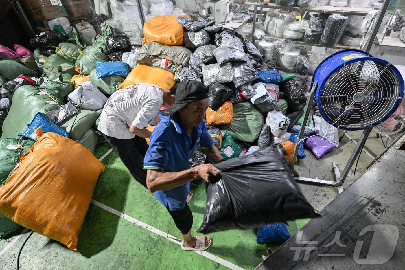 중국 광둥성 광저우 소재 테무 물류창고/2025.8.12ⓒ AFP=뉴스1