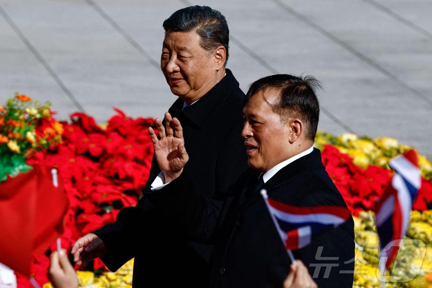 태국의 마하 와찌랄롱꼰 국왕과 시진핑 중국 국가주석이 2025년 11월 14일 베이징 인민대회당에서 열린 환영식에 참석하고 있다.2025.11.14. ⓒ AFP=뉴스1
