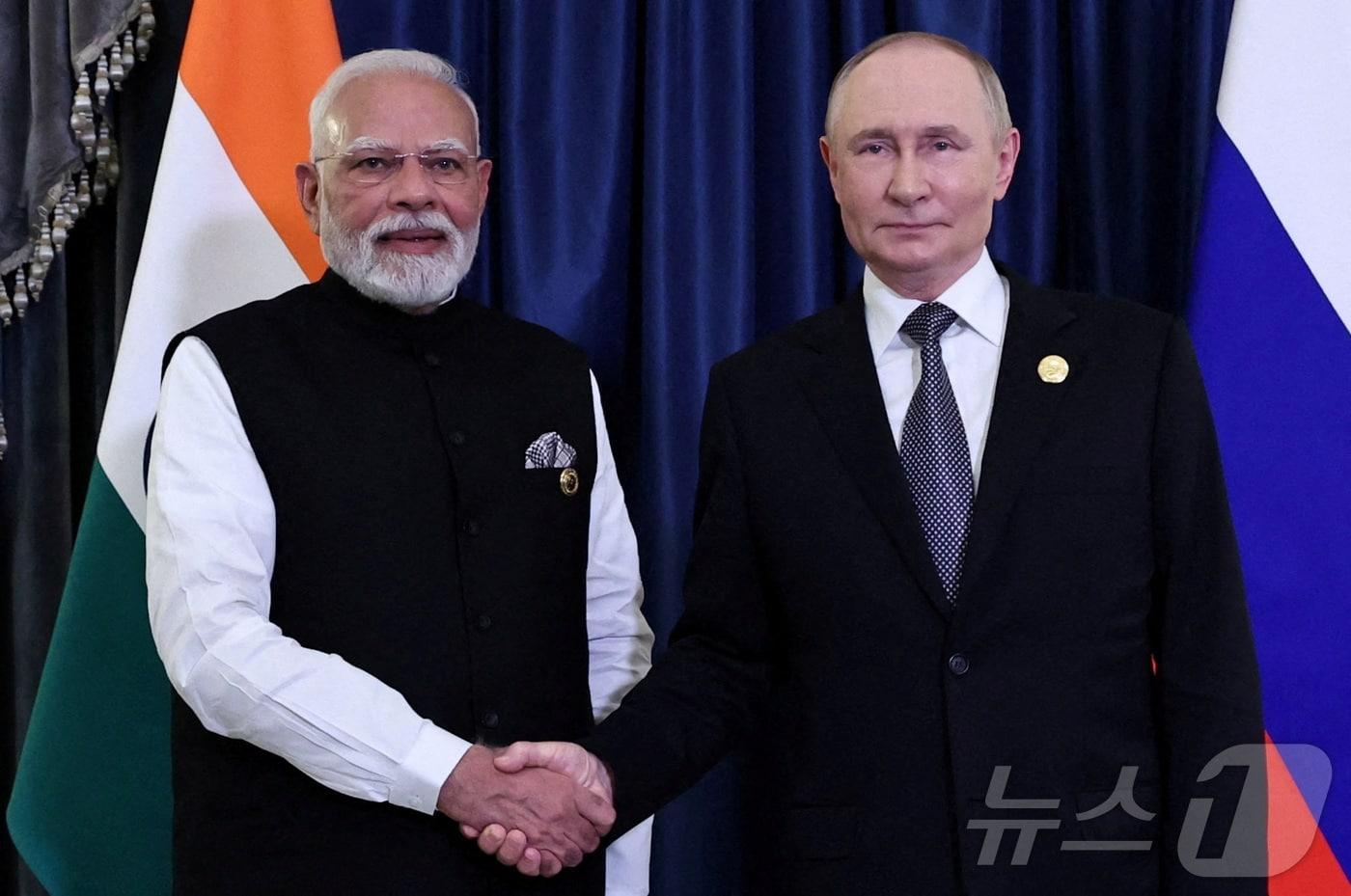 모디 인도 총리와 푸틴 러시아 대통령. 2025.09.01 ⓒ 로이터=뉴스1 ⓒ News1 이지예 객원기자