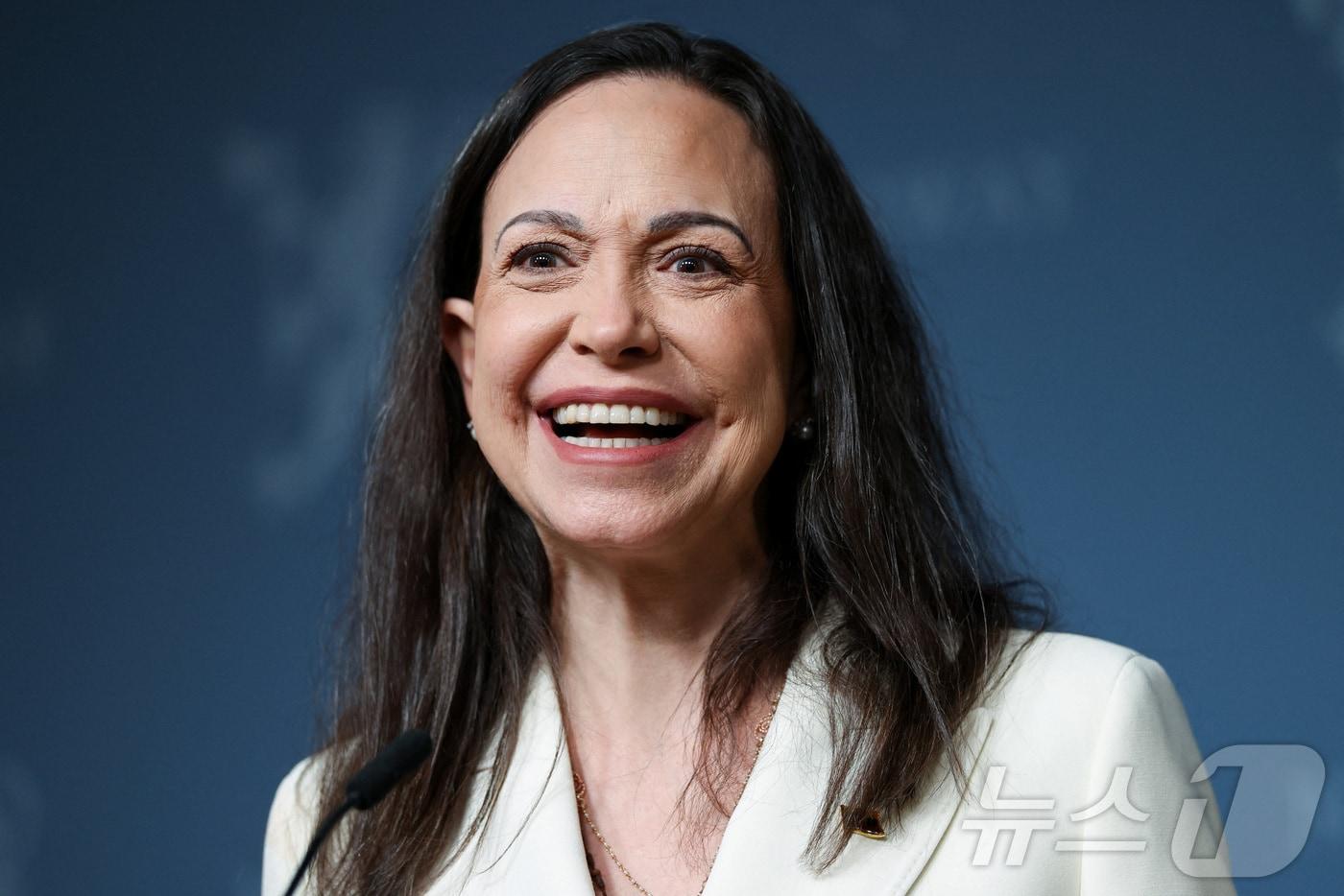 2025년 노벨평화상 수상자이자 베네수엘라 야당 지도자인 마리아 코리나 마차도가 노벨평화상 시상식 다음 날인 11일&#40;현지시간&#41; 노르웨이 오슬로에서 기자회견에 참석하고 있다. 2025.12.11 ⓒ 로이터=뉴스1 ⓒ News1 김경민 기자