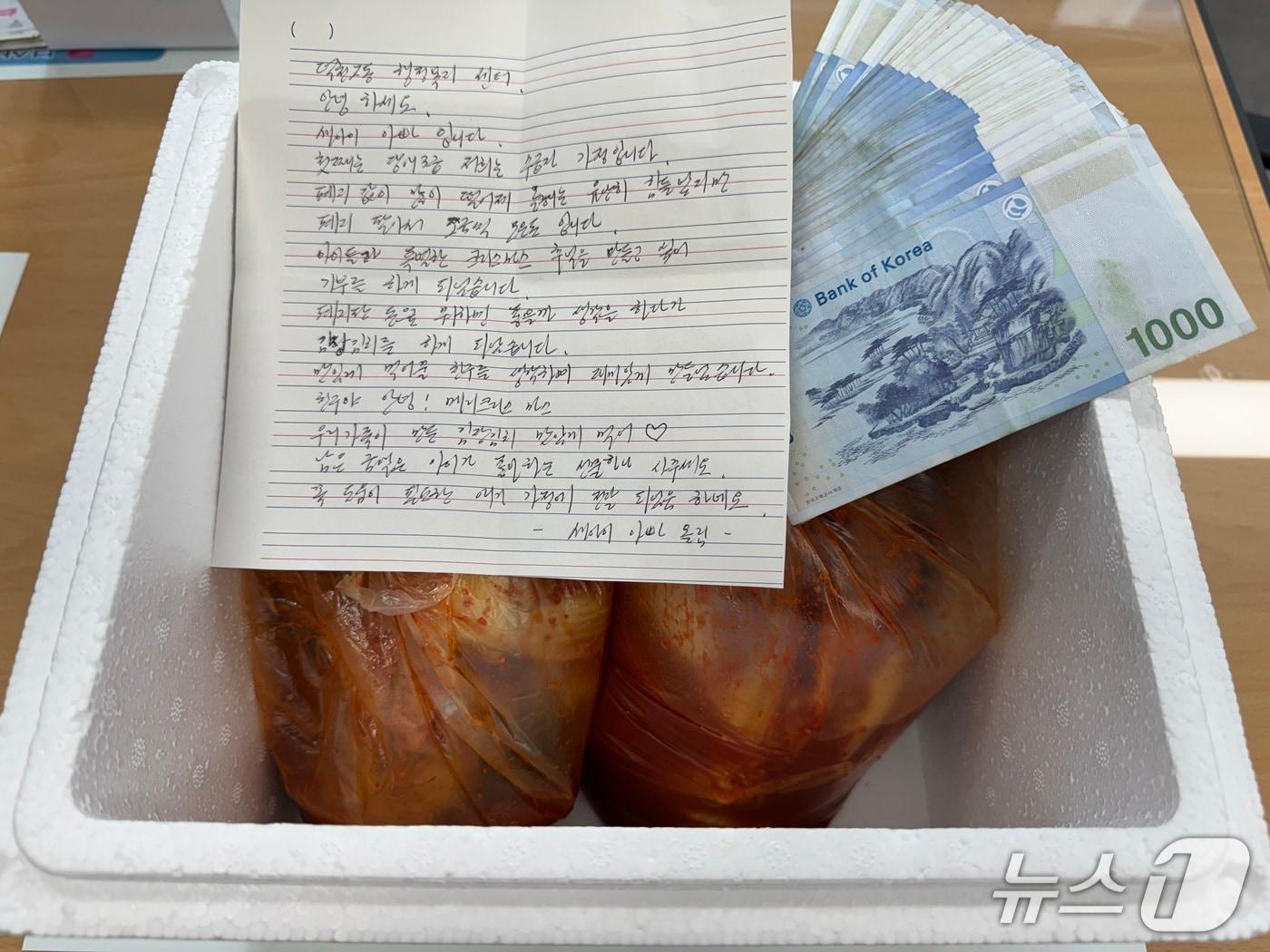 본문 이미지 - "폐지 값 떨어져 힘들지만…" 장애 아들 둔 기초수급자 아빠의 '특별한 크리스마스'(부산 북구청 제공. 재판매 및 DB금지)