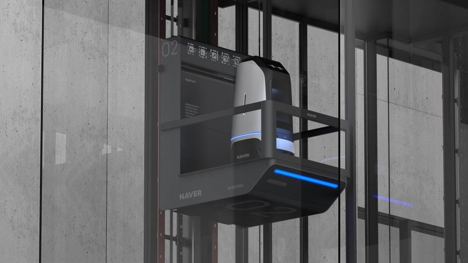 본문 이미지 - 경기 성남시 네이버 신사옥 ‘1784’에 설치된 로봇 전용 엘리베이터 로보포트(ROBOPORT)에서 로봇이 이송되는 모습. (네이버 제공)