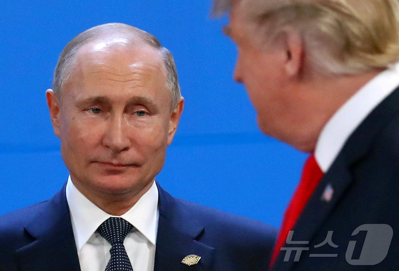본문 이미지 - 블라디미르 푸틴 러시아 대통령&#40;왼쪽&#41;과 도널드 트럼프 미국 대통령. ⓒ 로이터=뉴스1 ⓒ News1 이종덕 기자
