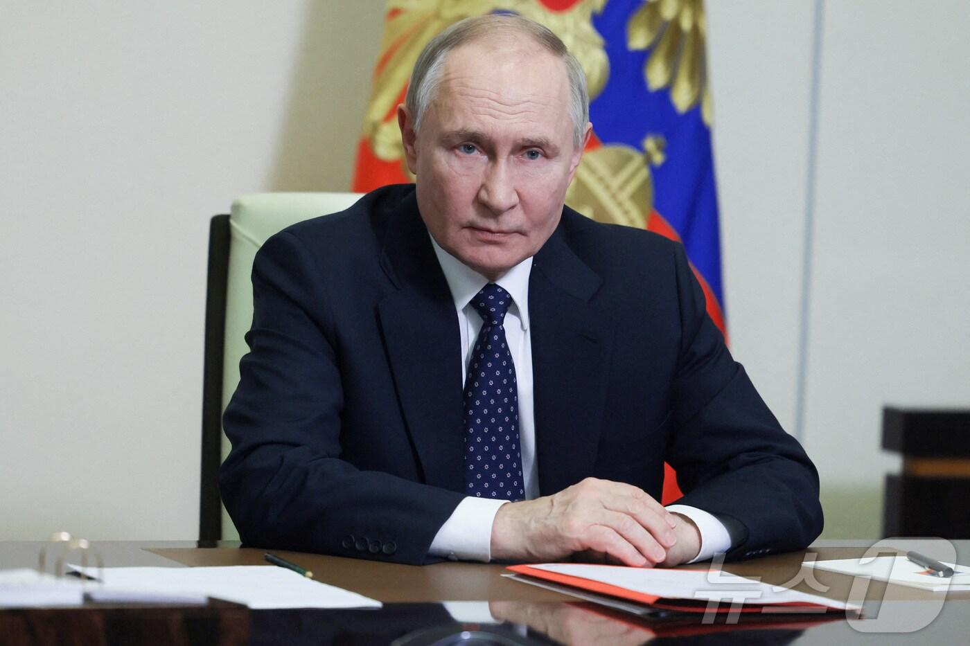 14일(현지시간) 블라디미르 푸틴 러시아 대통령이 모스크바 인근 노보-오가료보 관저에서 국가안보회의 화상회의에 참석하고 있다. 2025.03.14 ⓒ 로이터=뉴스1 ⓒ News1 김지완 기자