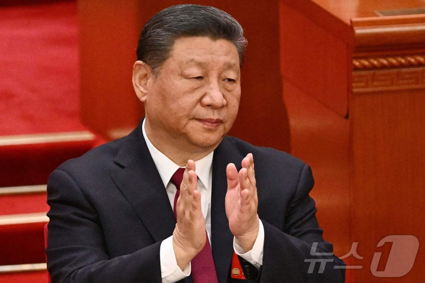 시진핑 중국 국가주석이 5일&#40;현지시간&#41; 베이징 인민대회당에서 열린 전국인민대표대회&#40;전인대&#41; 개막식에 참석해 박수를 치고 있다. 2025.03.05 ⓒ AFP=뉴스1 ⓒ News1 우동명 기자