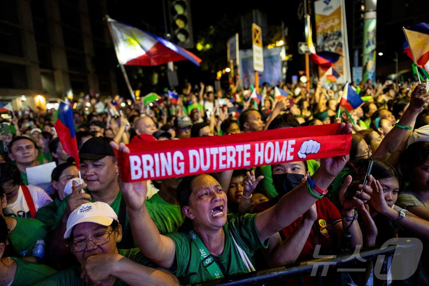 28일&#40;현지시간&#41; 네덜란드 국제형사재판소&#40;ICC&#41; 구금 시설에 수감중인 로드리고 두테르테 전 대통령의 지지자들이 필리핀 다바오에서 그의 석방을 촉구하는 시위를 하고 있다. 2025.03.28 ⓒ 로이터=뉴스1 ⓒ News1 김지완 기자