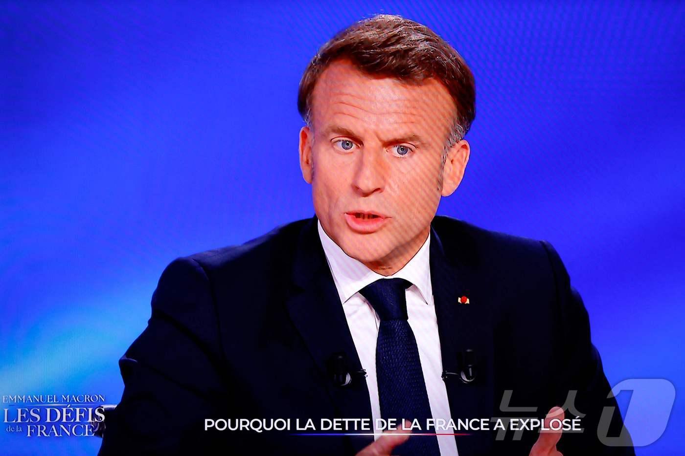 에마뉘엘 마크롱 프랑스 대통령이 13일(현지시간) 프랑스 TF1 방송에 출연해 발언하고 있다. 2025.05.13.ⓒ AFP=뉴스1