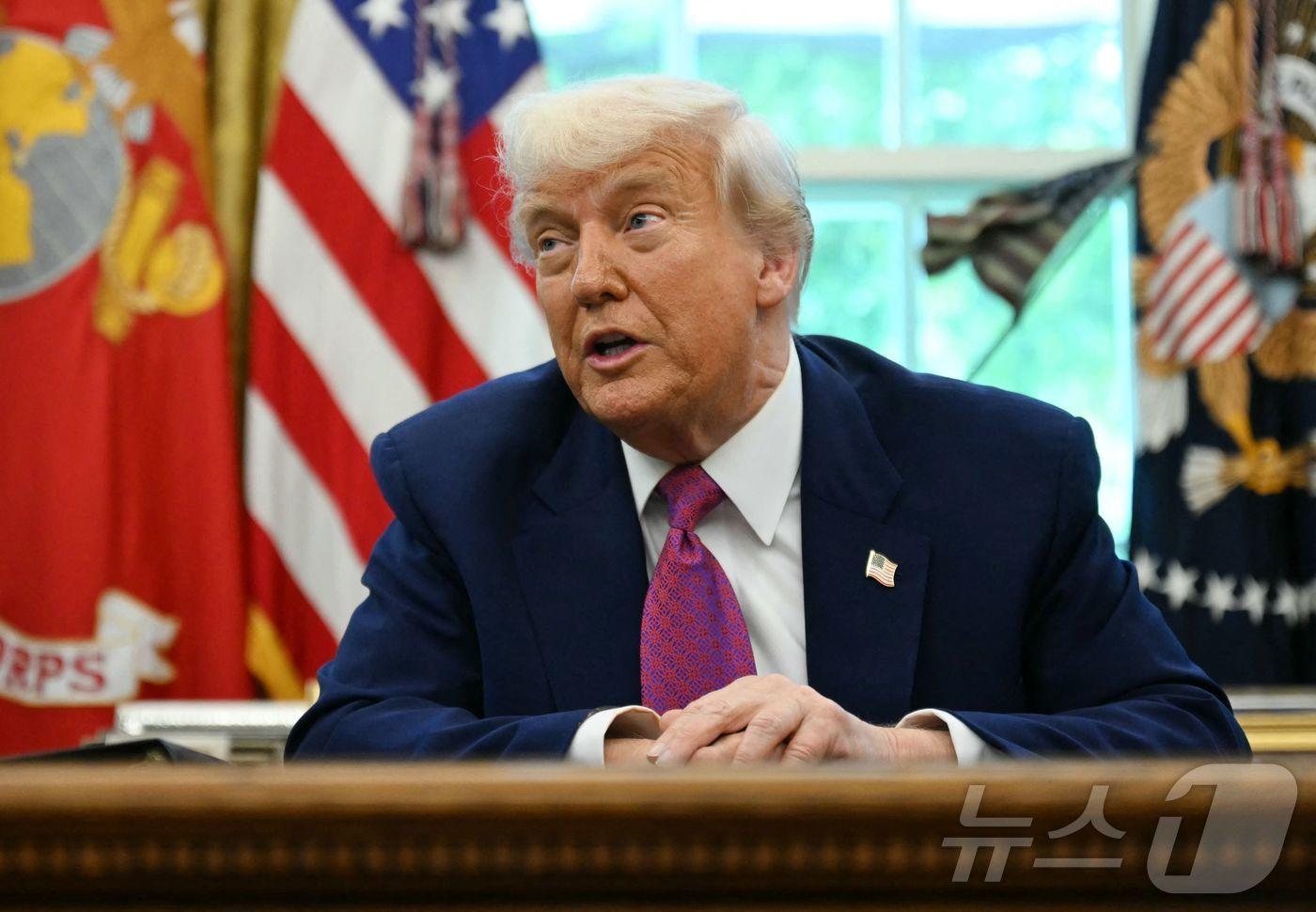 도널드 트럼프 미국 대통령이 5월 20일&#40;현지시간&#41; 워싱턴 백악관에서 열린 &#39;골든돔&#39; 추진 계획 발표 행사서 &#34;244조원 투입해 지상·해상·우주배치 미사일로 적 미사일·드론 요격하겠다”고 밝히고 있다. 2025.05.21 ⓒ AFP=뉴스1 ⓒ News1 우동명 기자