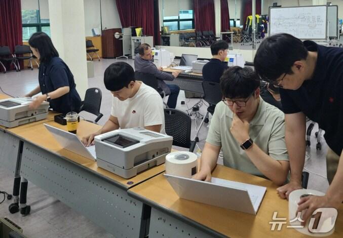 본문 이미지 - 사전투표 전 모의시험(광주 남구 제공. 재판매 및 DB 금지)