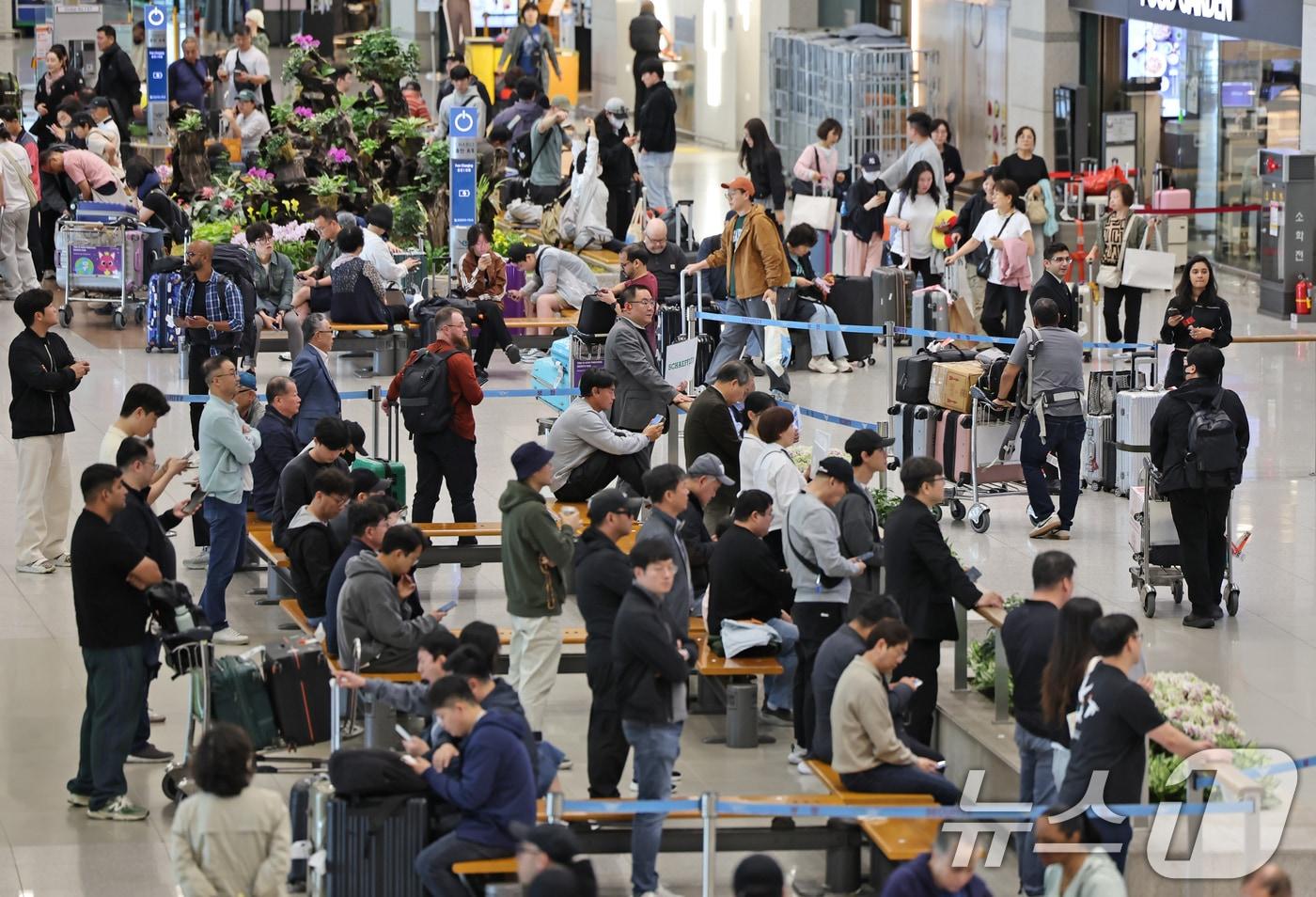 지난 5월6일 인천국제공항 제1터미널 입국장. (사진은 기사 내용과 무관함) / 뉴스1 ⓒ News1/뉴스1 ⓒ News1 장수영 기자
