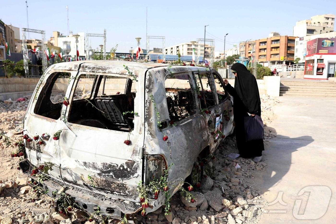 이란 테헤란에서 이스라엘의 공습으로 불에 타버린 이란 구급차의 모습. ⓒ AFP=뉴스1 ⓒ News1 김예슬 기자