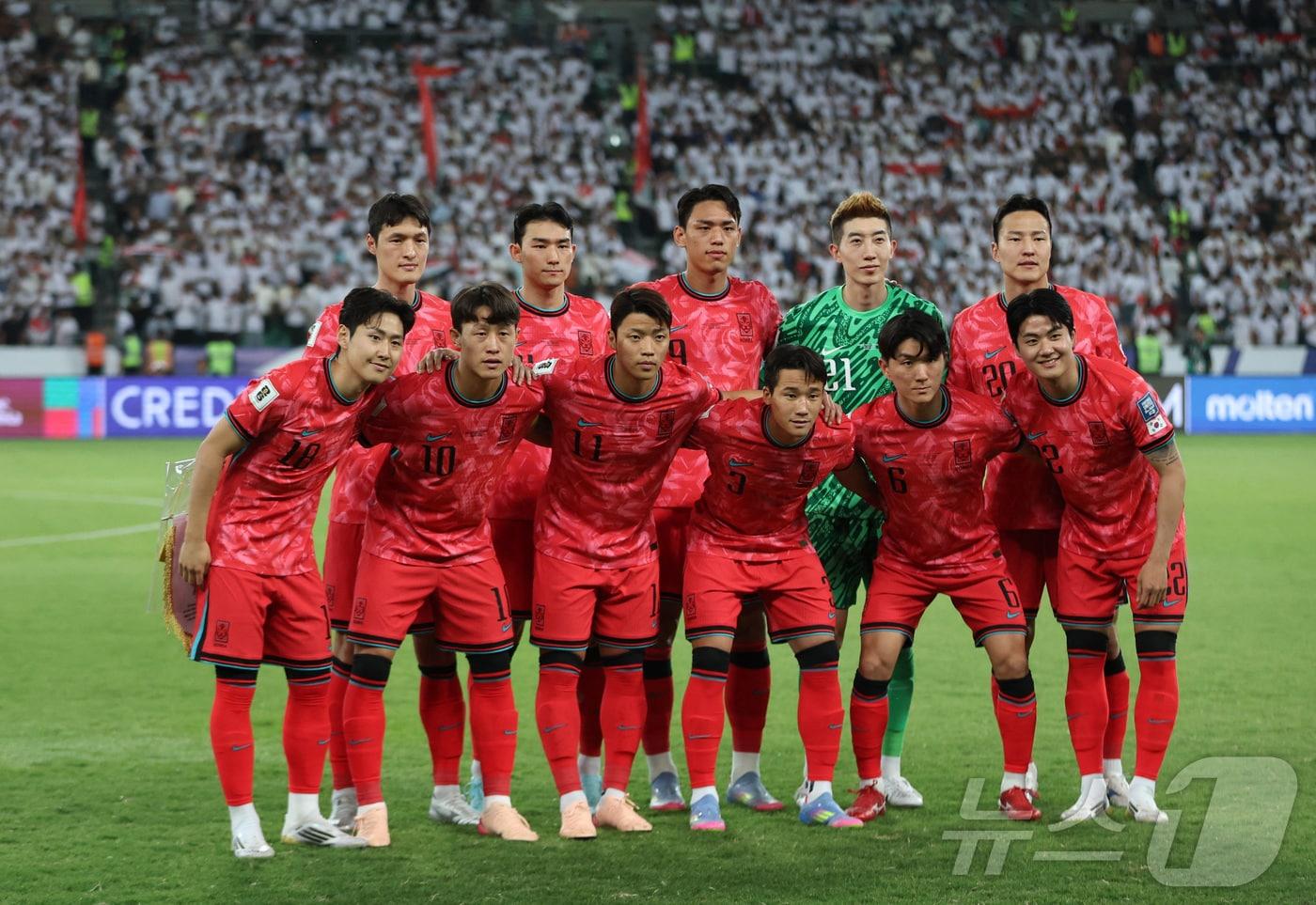 이라크전 승리로 11회 연속 본선 진출을 확정한 축구대표팀 ⓒ 로이터=뉴스1