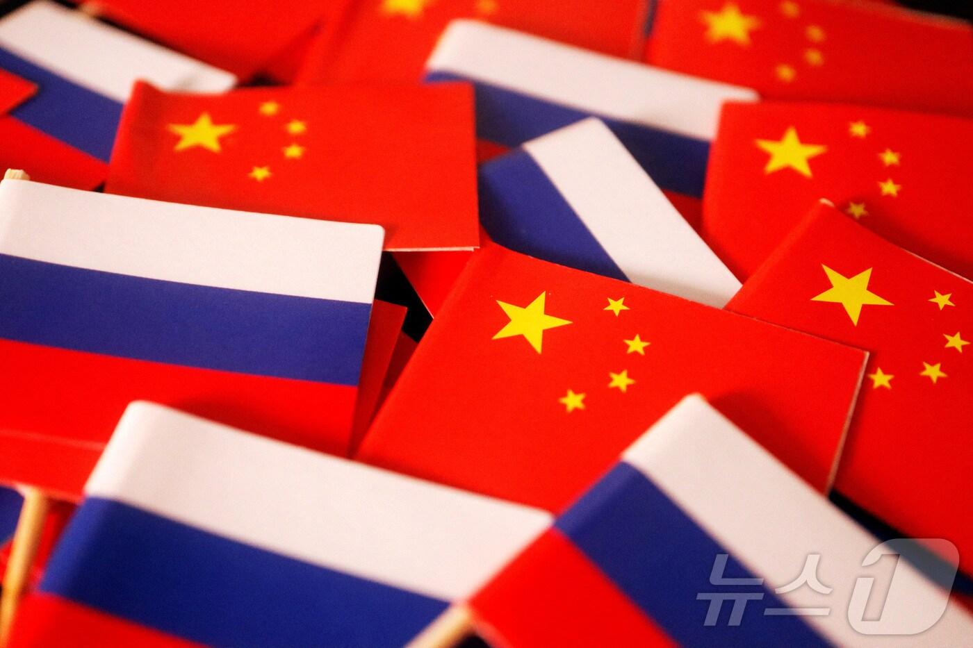 중국과 러시아 국기. 2022.03.24. ⓒ 로이터=뉴스1 ⓒ News1 윤다정 기자