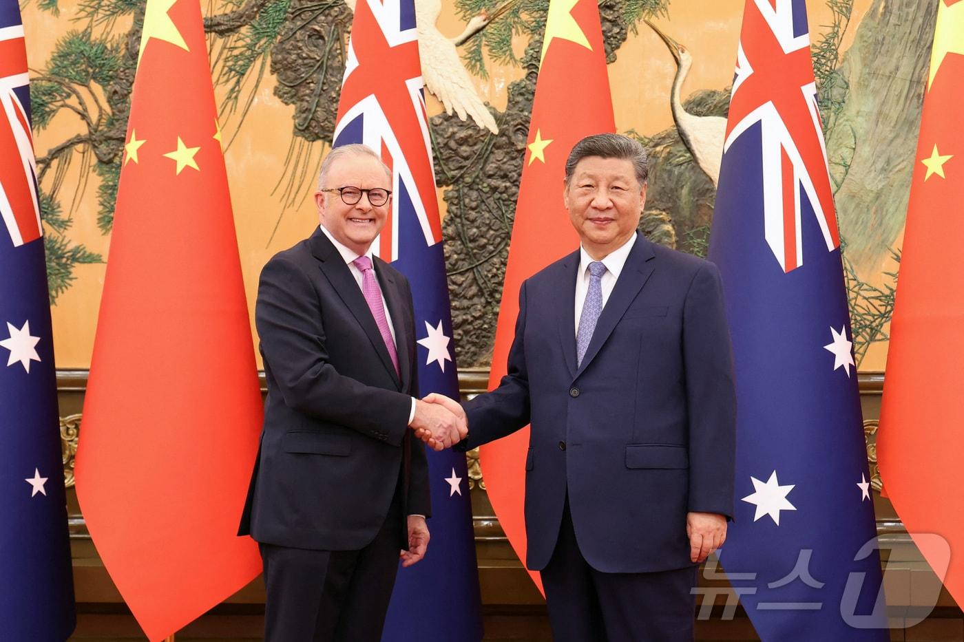 시진핑 중국 국가주석과 앤서니 앨버니지 호주 총리가 15일 베이징 인민대회당에서 악수를 하고 있다. 2025.07.15 ⓒ 로이터=뉴스1 ⓒ News1 정은지 특파원