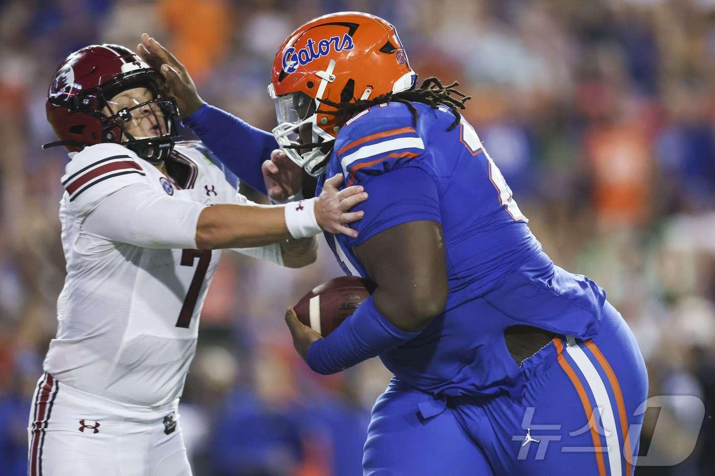 대학시절 데스먼드 왓슨(오른쪽)의 경기 모습. ⓒ AFP=뉴스1