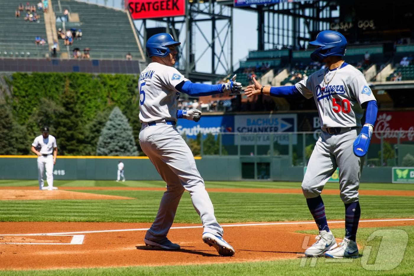 LA 다저스가 22일(한국시간) 열린 2025 메이저리그 콜로라도 로키스와 원정 경기에서 9-5로 승리했다. ⓒ AFP=뉴스1