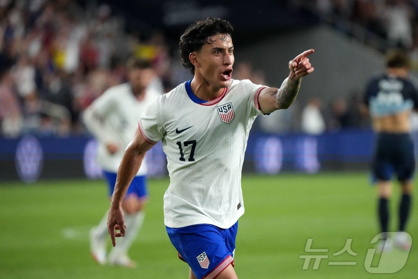 일본을 상대로 득점을 기록한 미국의 알렉스 젠덴하스. ⓒ AFP=뉴스1