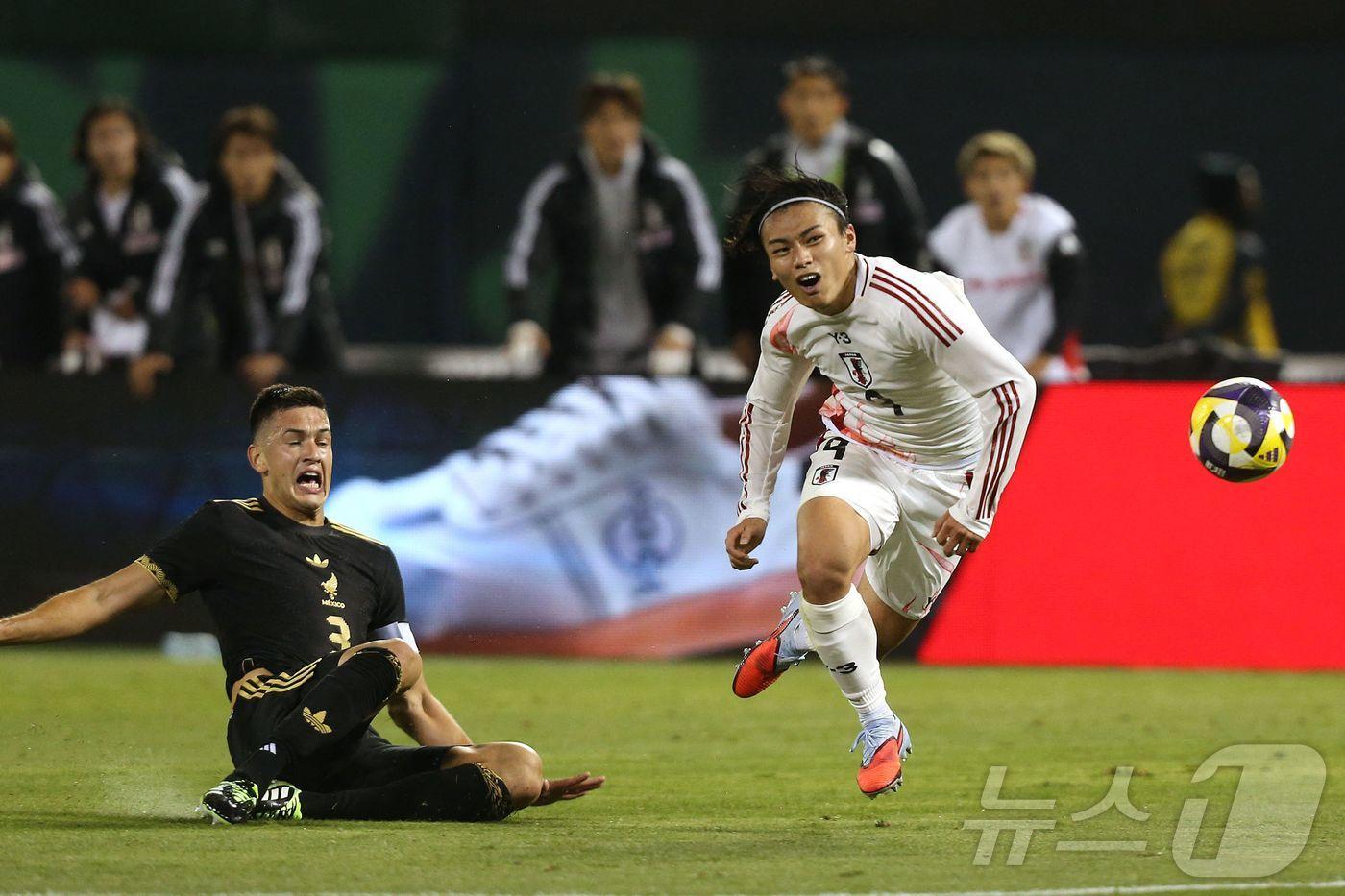 멕시코와 일본의 경기 모습 ⓒ AFP=뉴스1