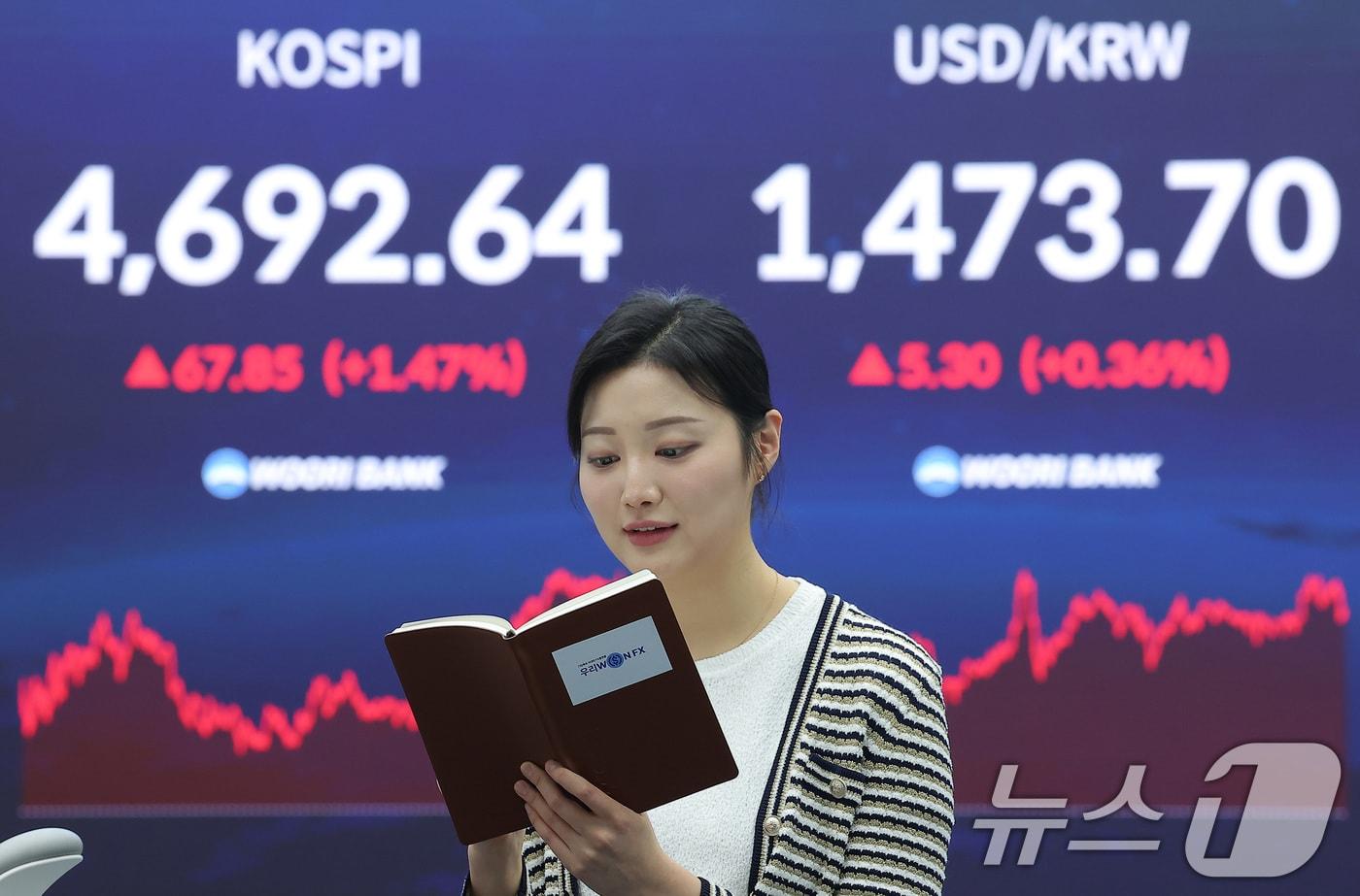 서울 중구 우리은행 본점 딜링룸 전광판에 증시 표시가 나오고 있다.  2026.1.13/뉴스1 ⓒ News1 김성진 기자