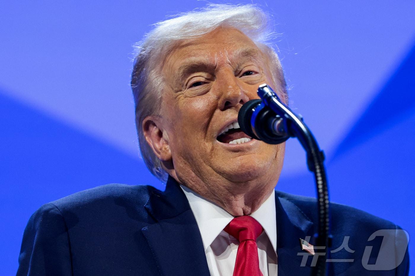 본문 이미지 - 21일(현지시간) 도널드 트럼프 미국 대통령이 스위스 다보스에서 열린 세계경제포럼(WEF) 연례총회(다보스포럼)에 참석해 기조연설을 하고 있다. 2026.01.21 ⓒ 로이터=뉴스1 ⓒ News1 김지완 기자