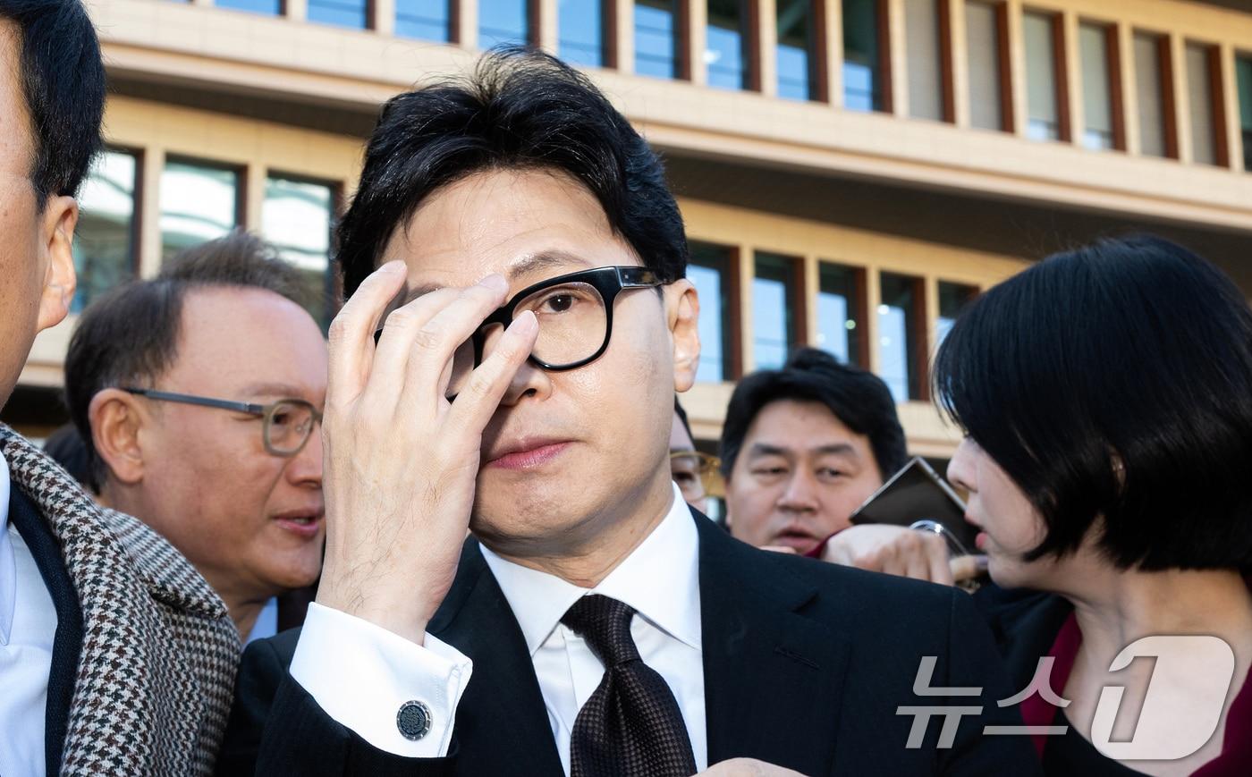 본문 이미지 - 한동훈 전 국민의힘 대표가 지난 1월 29일 서울 여의도 국회 소통관에서 국민의힘 지도부의 제명 결정에 관한 입장 발표를 마치고 차량으로 향하고 있다. (공동취재) 2026.1.29/뉴스1 ⓒ News1 이승배 기자