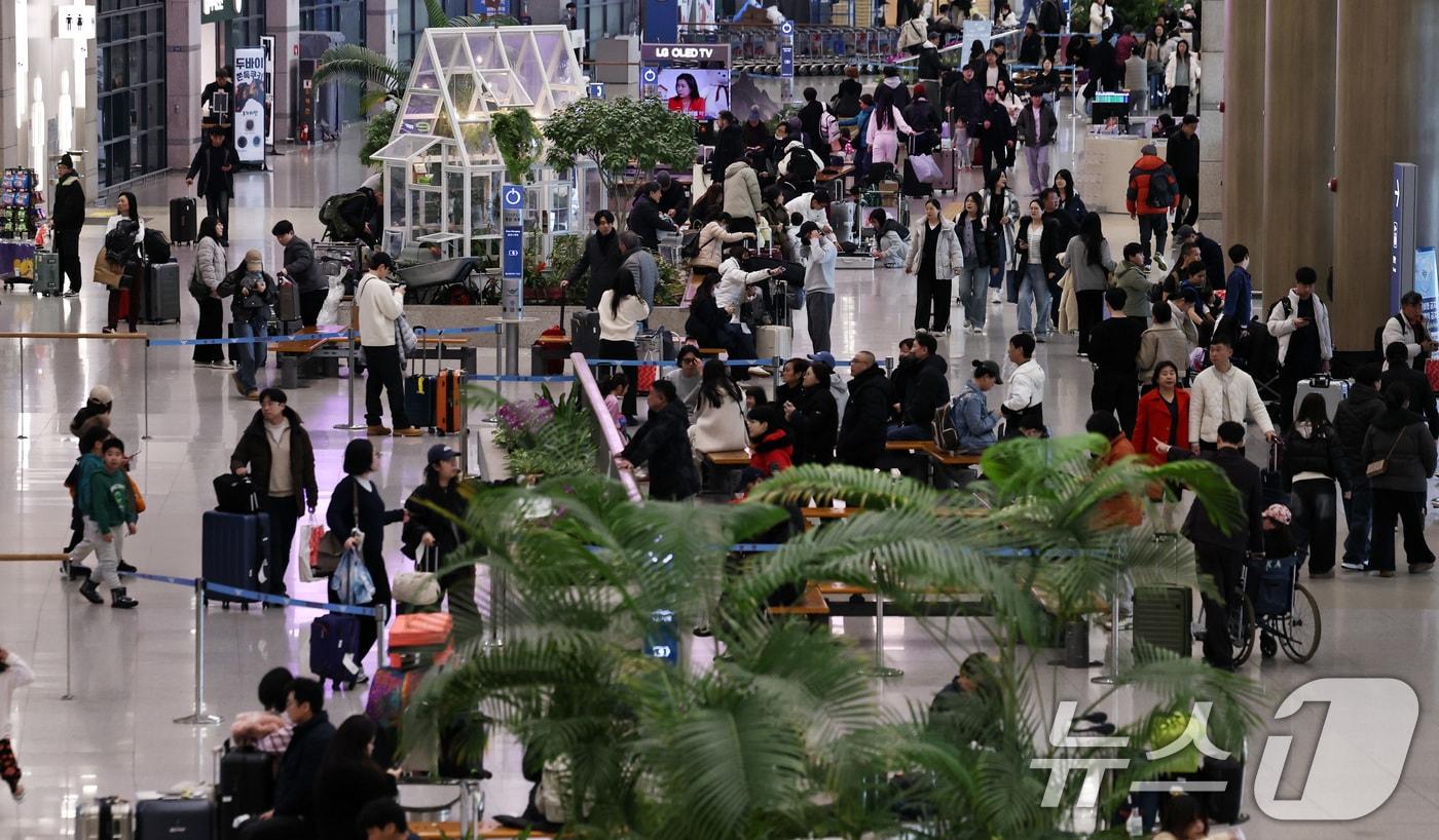 본문 이미지 - 지난달 18일 인천국제공항 제1여객터미널 입국장. ⓒ 뉴스1 구윤성 기자