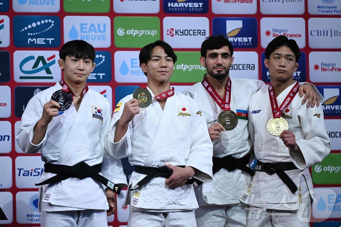 본문 이미지 - 김찬녕(왼쪽)이 8일(한국시간) 프랑스 파리에서 열린 2026 파리 그랜드슬램 남자 66㎏급에서 은메달을 획득했다. ⓒ AFP=뉴스1