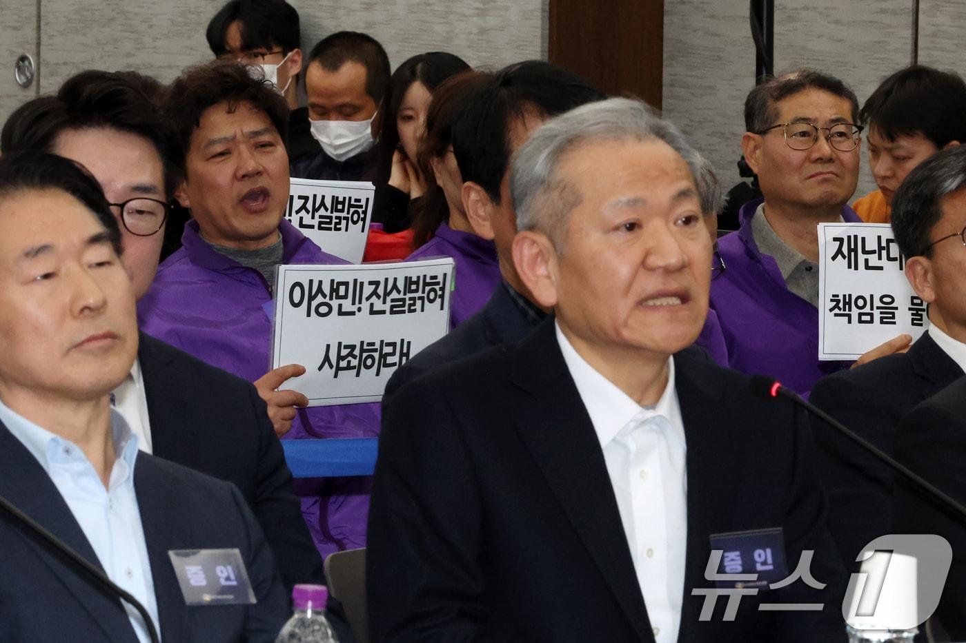 본문 이미지 - 이상민 전 행정안전부 장관이 12일 오후 서울 중구 은행회관에서 열린 10·29이태원참사 진상규명 청문회에서 심문 질의에 답하는 가운데 유가족들이 소리쳐 항의하고 있다. (공동취재) 2026.3.12 ⓒ 뉴스1 최지환 기자