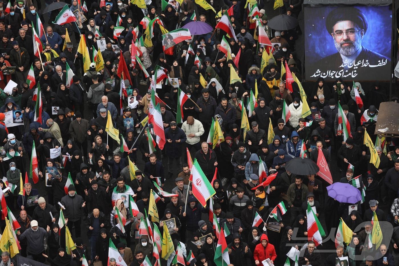 본문 이미지 - 이란 테헤란의 쿠드스의날 집회. 2026.03.13 ⓒ 로이터=뉴스1