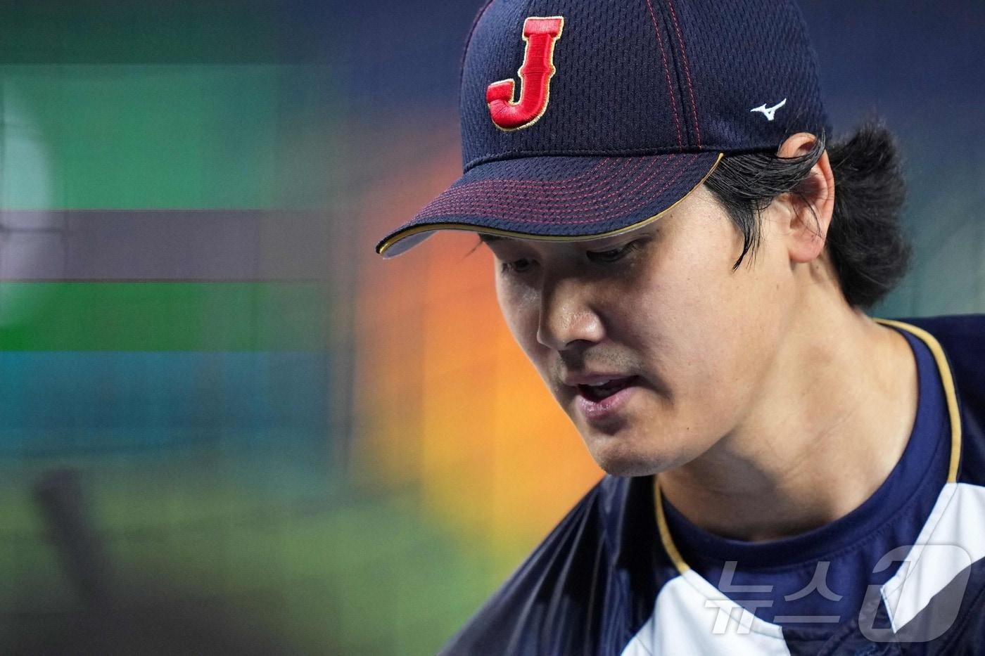 본문 이미지 - 오타니 쇼헤이(사진)를 앞세운 일본 야구대표팀은 2026 WBC에서 2연패를 도전했지만, 15일(한국시간) 열린 8강전에서 베네수엘라에 5-8로 졌다. ⓒ AFP=뉴스1