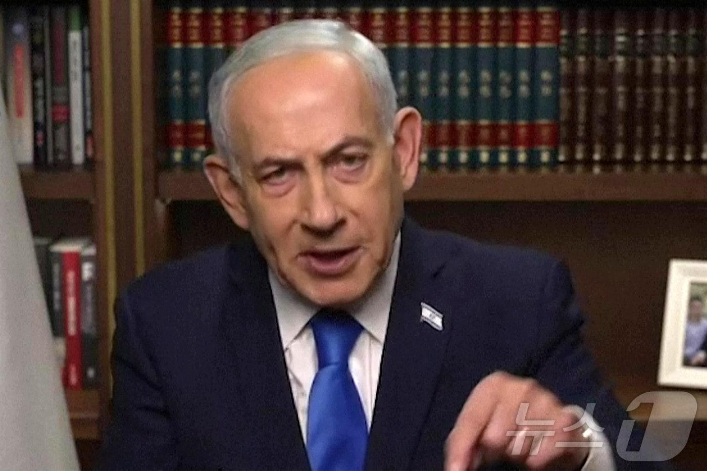 본문 이미지 - 베냐민 네타냐후 이스라엘 총리가 지난달 28일 영상 연설을 통해 이란에 대한 군사 작전을 공식화하고 있다. 2026.2.28 ⓒ AFP=뉴스1