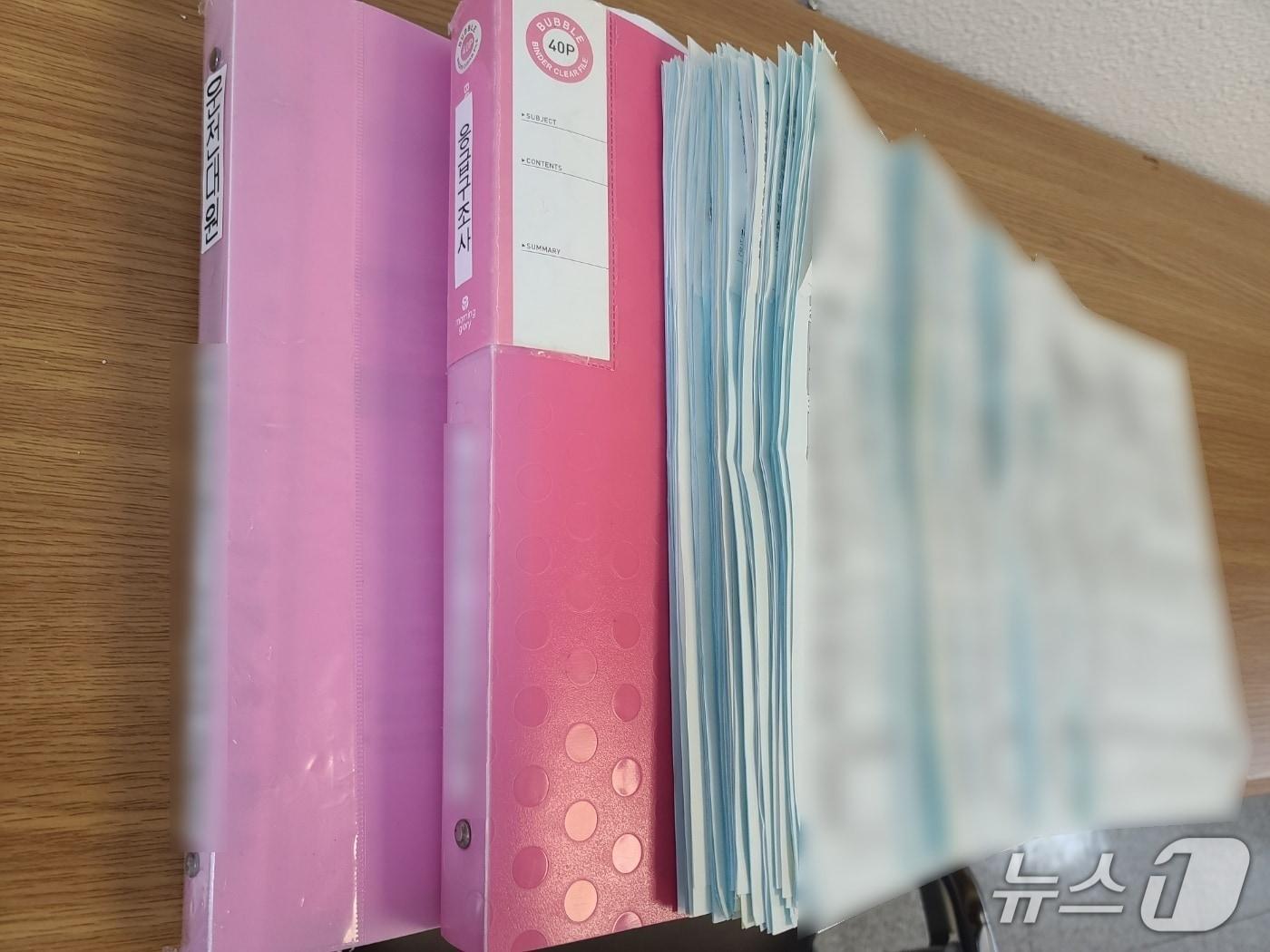 본문 이미지 - 경찰이 위법 운영된 응급환자이송업체로부터 압수한 서류.(부산경찰청 제공. 재판매 및 DB 금지)