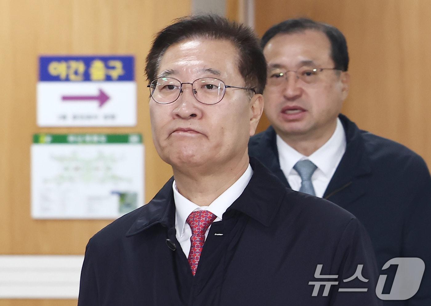 본문 이미지 - 박성재 전 법무부 장관이 9일 오전 서울 서초구 서울중앙지방법원에서 열린 내란가담 및 김건희 수사무마 1심 속행 공판에 출석하고 있다. 2026.3.9 ⓒ 뉴스1 김민지 기자