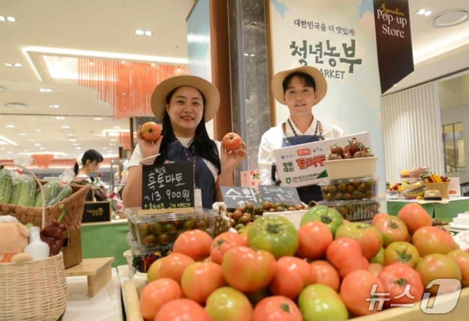 본문 이미지 - 롯데아울렛 이시아폴리스점은 오는 22~25일 '청년농부 파머스 마켓'을 진행한다. 사진은 지난해 5월 롯데백화점 부산본점에서 열린 '청년농부 파머스 마켓' 모습.(롯데백화점 제공, 재판매 및 DB 금지)