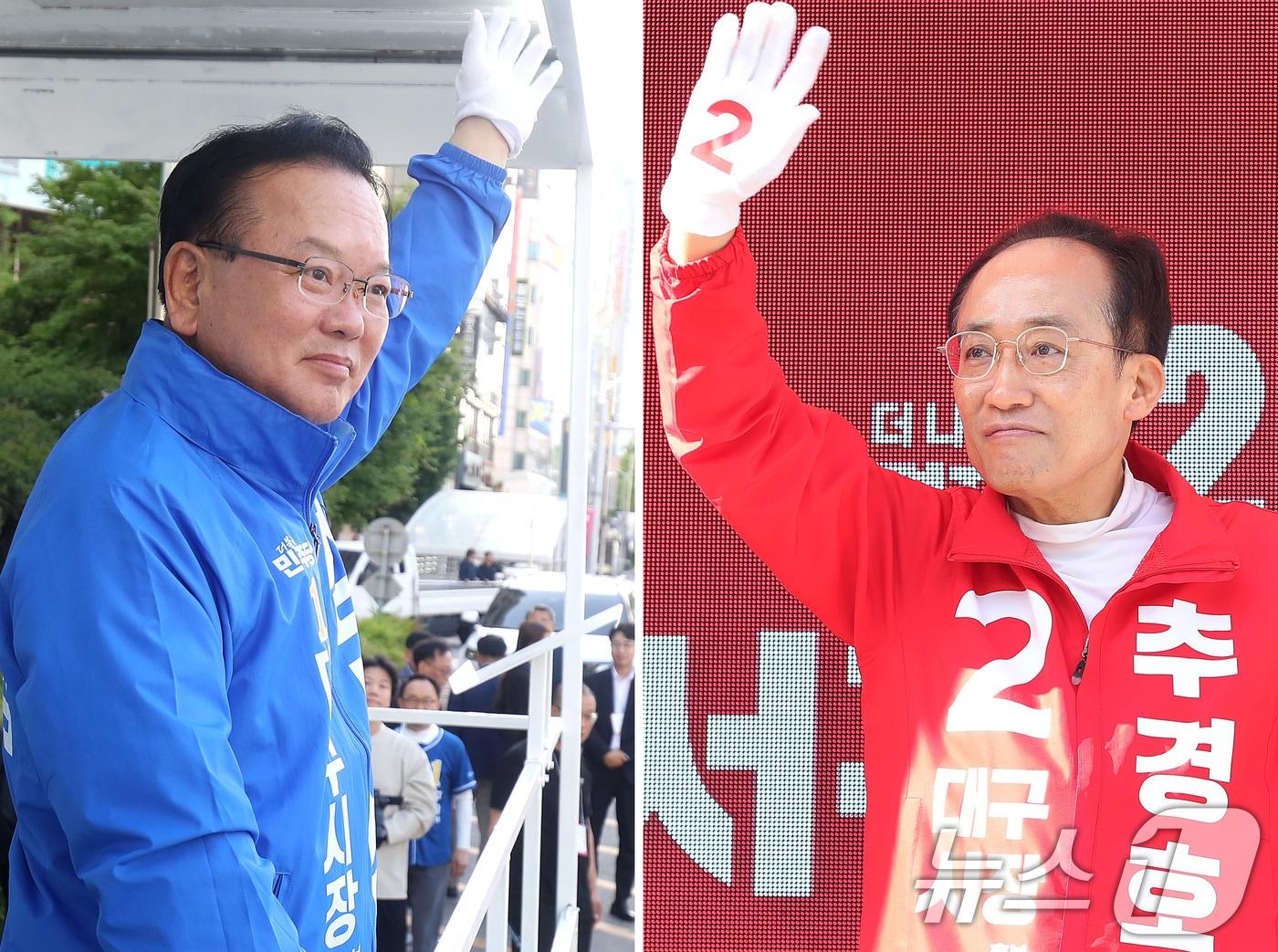 본문 이미지 - 지방선거 공식 선거운동 이틀째인 22일 오전 김부겸 더불어민주당 대구시장 후보(왼쪽)가 대구 중구 반월당사거리에서 출근길 시민들을 향해 인사하고 있다. 오른쪽은 대구 수성구 범어네거리에서 출근길 인사를 하는 추경호 국민의힘 대구시장 후보. 2026.5.22 ⓒ 뉴스1 공정식 기자