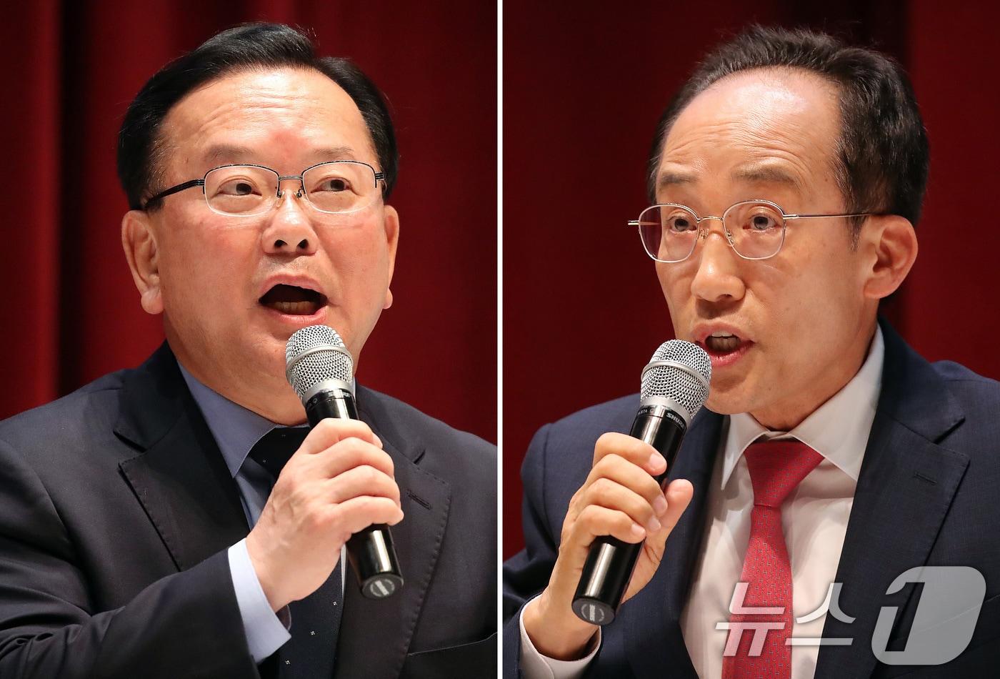 본문 이미지 - 김부겸 더불어민주당 대구시장 후보(왼쪽)와 추경호 국민의힘 대구시장 후보가 22일 오후 대구 동구 봉무동 대구텍스타일 콤플렉스에서 열린 대구 사회복지유권자연맹 초청 대담회에서 사회복지사들이 요청한 8대 핵심 공약에 대해 답하고 있다. 2026.5.22 ⓒ 뉴스1 공정식 기자