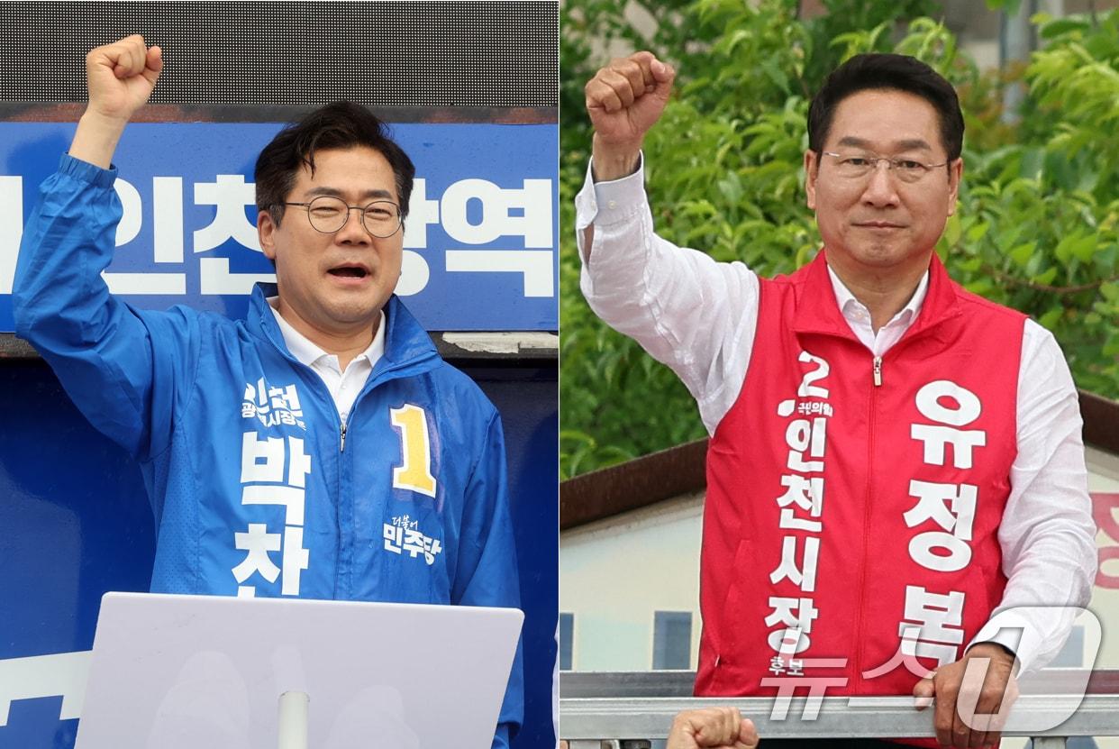 본문 이미지 - 박찬대 더불어민주당 인천시장 후보(왼쪽)와 유정복 국민의힘 인천시장 후보가 27일 오후 인천 강화군 강화풍물시장에서 유권자들에 지지를 호소하고 있다. 2026.5.27 ⓒ 뉴스1 황기선 기자